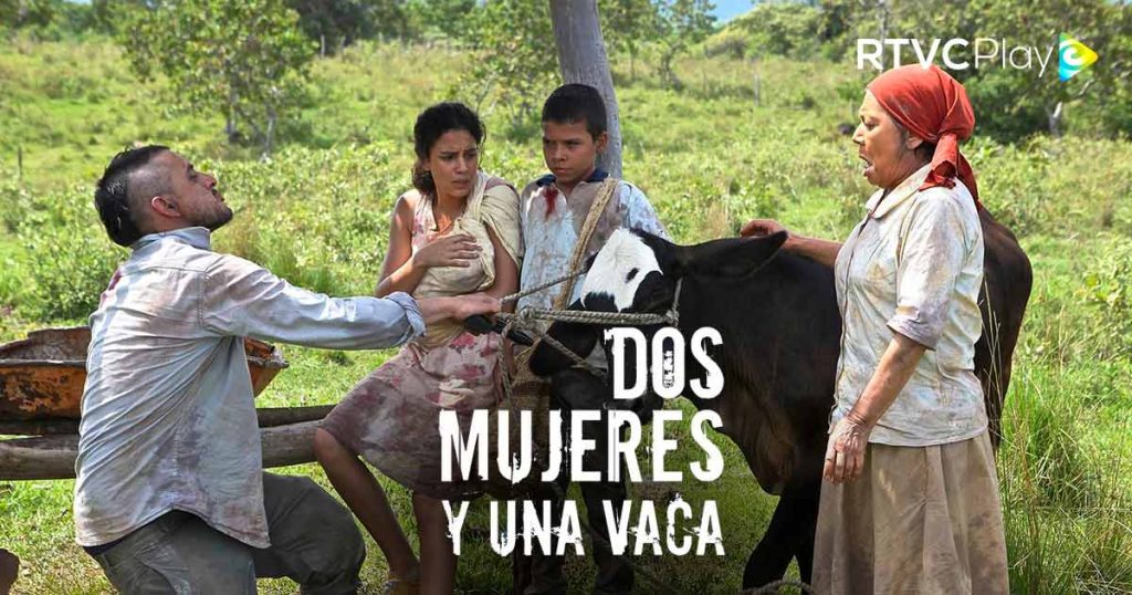 Dos mujeres y una vaca